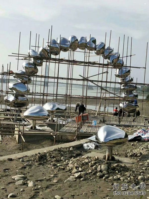 鵝卵石門頭雕塑,創意藝術設計,不銹鋼景觀大門雕塑